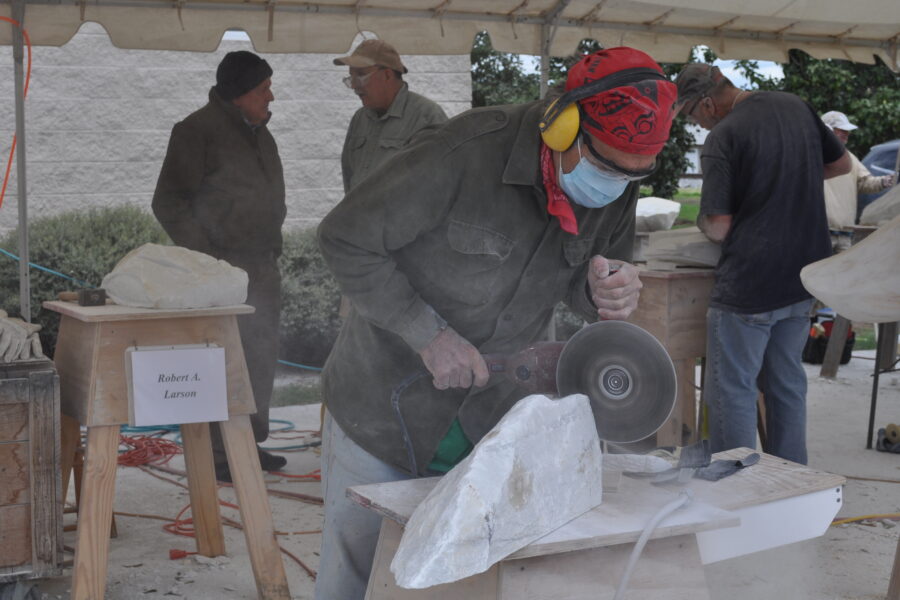 sculptor working with alabama marble